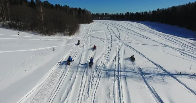 The group on snowmobiles