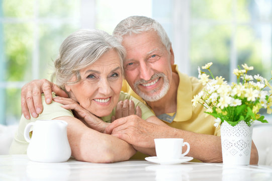 Happy senior couple drinking tea  