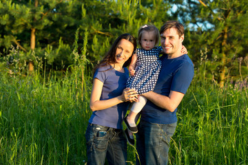 Happy family on a walk in the Park