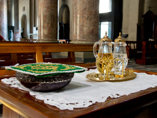 holy water and holy wine ready for mass