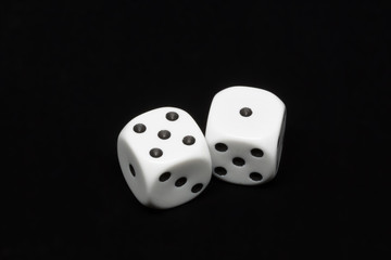 The dices are cast - two dices showing five and one for a total of six