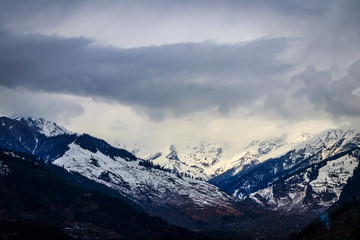 Fototapeta na wymiar View of snow clad Himalayas mountains from Manali,India