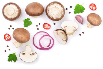 Fresh champignon mushrooms with parsley isolated on white background with copy space for your text. Top view