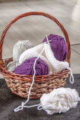 Fototapeta na wymiar Knitting basket with yarns