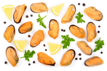 mussels with parsley lemon and peppercorns isolated on white background. Top view. Flat lay