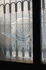 funny face on the window