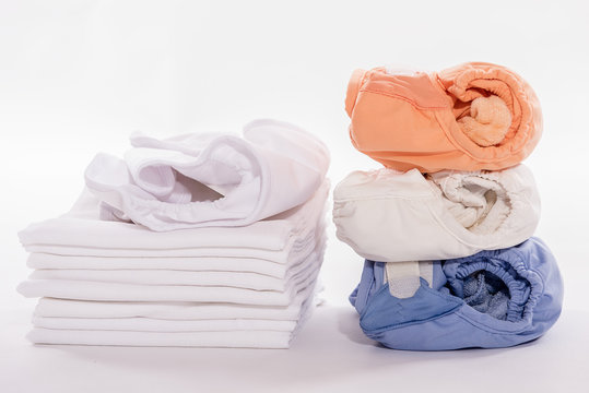 reusable washable ecological organic cotton nappy nappies on white background 