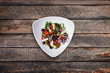 salad of fresh vegetables with marinated goat cheese in Provencal herbs.