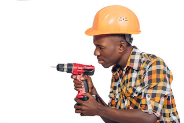 African American worker uses electric screwdriver