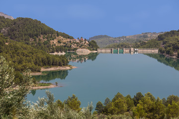 Fototapeta na wymiar Panorama of the reservoir and dam near Guadalest. Alicante. Spain. Summer afternoon.