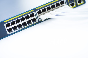 Corporate network concept. Set of ethernet switches, access points, cables, connectors, laptops on...