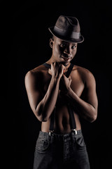 afro-american man in hat and suspenders