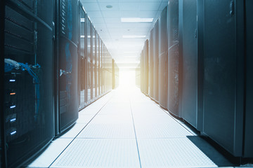 Data center room with rows of equipment