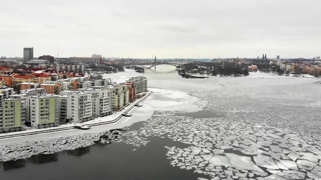 Aerial view of Stockholm on a wintry day.  Apartment buildings of "Lilla Essingen" in the foreground. 