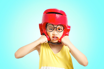 Little girl boxing action with headguard and injured face. Clipping path