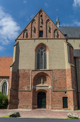 Fototapeta na wymiar Entrance to he St. Ludgeri church in Norden