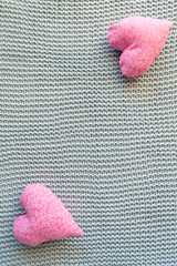 Fototapeta na wymiar the inscription love pink thread with a plush heart Fasano on a blue background