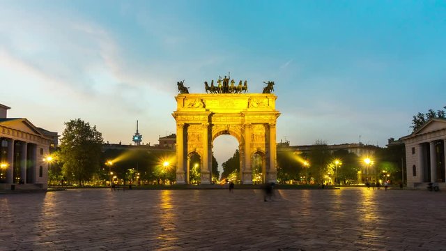 Time lapse of Arco della Pace "Arch of Peace" in Milan , Italy . It is the city gate of Milan located at the center of Simplon Square in Milan , Italy .