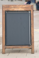 Fototapeta na wymiar blackboard outdoors with blank space for caption