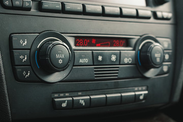 Interior of BMW e90 sedan with recaro type seats. Salon with seats, electronics, gauges, buttons, steering, mirrors and windows. Bayerische Motoren Werke.
