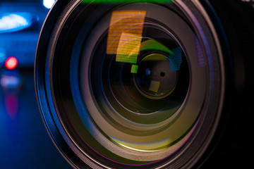 Photo Camera or Video lens close-up on black background DSLR objective