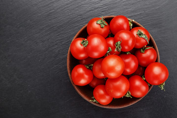 Red tomatoes, Tomatoes background. Black background.