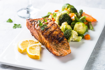 Grilled salmon fillet with vegetables mix. 
