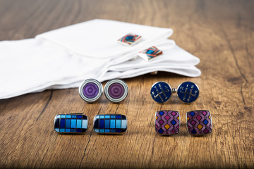 Cufflinks with shirt on the wooden ground