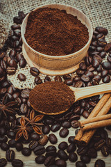 A cup of latte coffee and coffee beans. Toning.