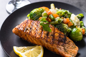 Grilled salmon fillet with vegetables mix. 