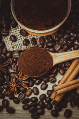 A cup of latte coffee and coffee beans. Toning.