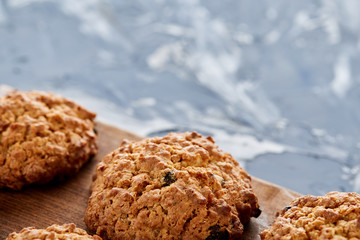 Top view close-up picture of tasty cookies on the cutting board, shallow depth of field, selective focus