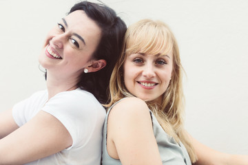 two girl friend relax with happiness and joyful moment with white wall background