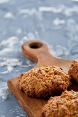 Top view close-up picture of tasty cookies on the cutting board, shallow depth of field, selective focus