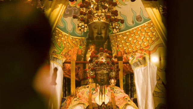 Baosheng Dadi statue inside of the Dalongdong Baoan Temple in Taipei, Taiwan. Is a Chinese god of medicine worshiped in Chinese folk religion.