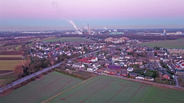 Aerial Skyline of Duisburg Mndelheim with the steel production plant in the background, Germany