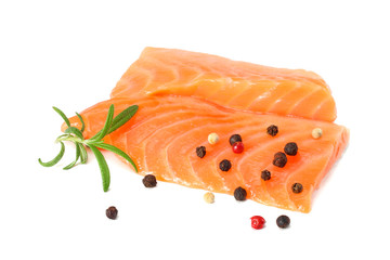 Red fish. Raw salmon fillet with rosemary isolate on white background