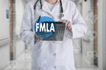 Family Medical Leave Act. FMLA on the touch screen with icons on the background blur medicine Doctor in hospital.Innovation treatment, service, health data analysis. 