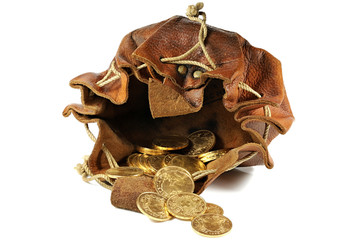 Swiss Vreneli gold coins in a leather purse isolated on background