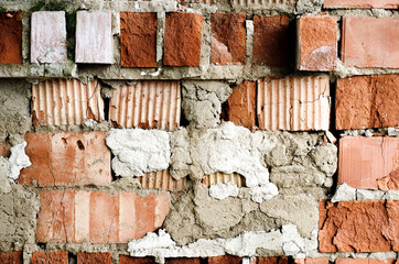 Old brick wall, old texture of red stone blocks closeup, loft style