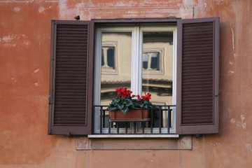 Fototapeta na wymiar window with the flowers italy