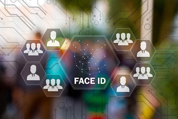 FACE IDENTIFICATION on the touch screen for log on to the network, on people blur background.Concept of Scanning,facial recognition for security. Biometric verification, face recognition technology