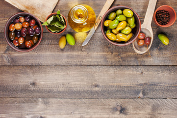 Textured background with salted olives of several varieties