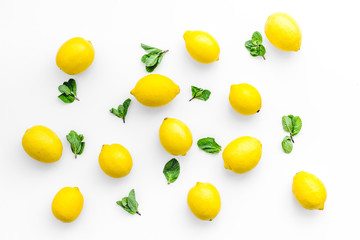 yellow citrus fruit set with lemons white background top view pattern