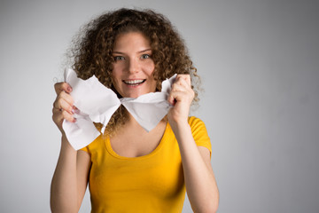  woman furiously tore the paper