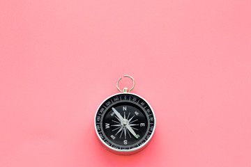 Direction concept with compass on pink background top view mockup