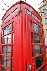 red telephone box on the street of London city, Great Britain, United Kingdom