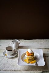 Peach dessert with coffee and cream