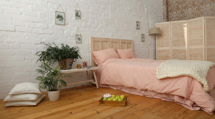 Fototapeta na wymiar spring decorated bedroom with wood floor and white wall