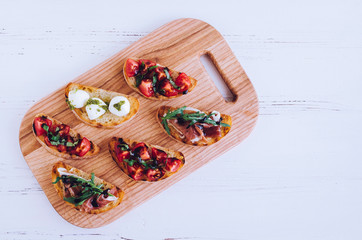 Italian bruschetta on cutting board